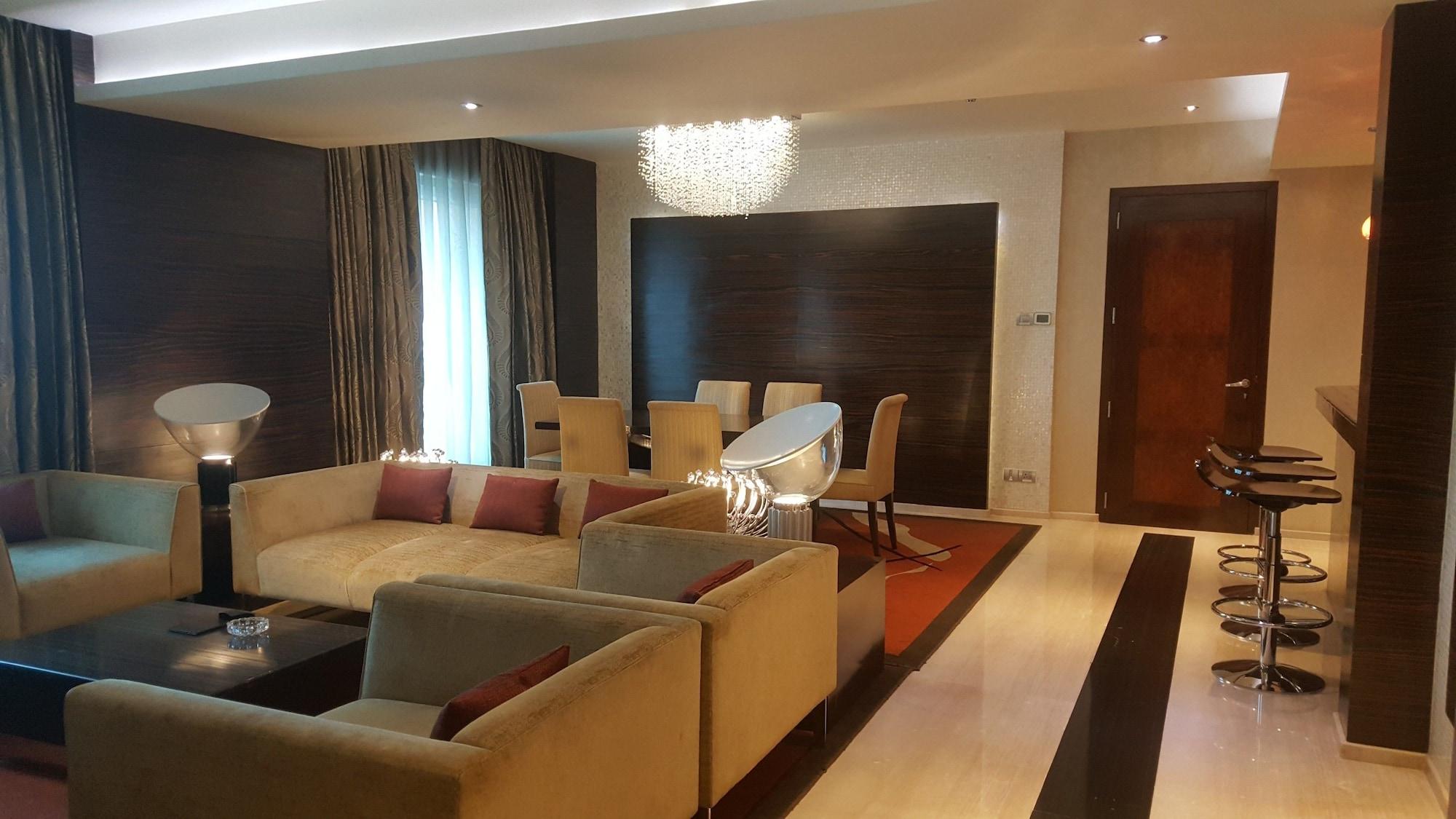 Vivanta Hyderabad, Begumpet Kültér fotó A living room in a suite at the Ritz-Carlton, DIFC